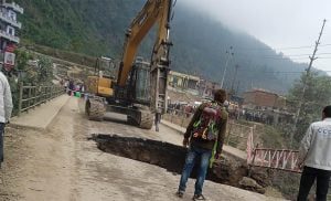 huge hole on the road, prithvi highway