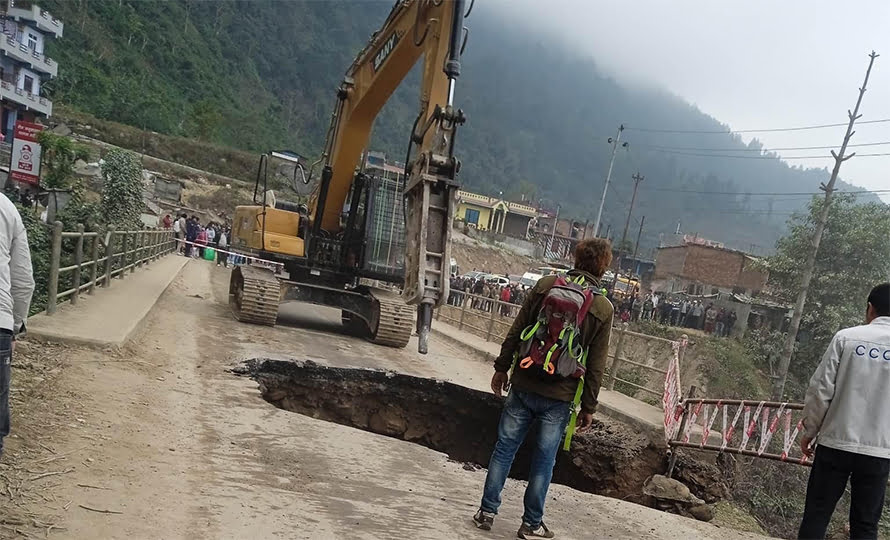 huge hole on the road, prithvi highway