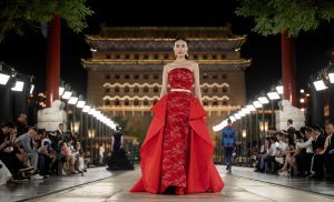 (230916) -- BEIJING, Sept. 16, 2023 (Xinhua) -- A model presents a creation designed by Laurence Xu during the Beijing Fashion Week in Beijing, capital of China, Sept. 15, 2023. The fashion week is held in Beijing from September 15 to 22, featuring shows and activities at the location of several fashion landmarks in the city. (Xinhua/Cai Yang)